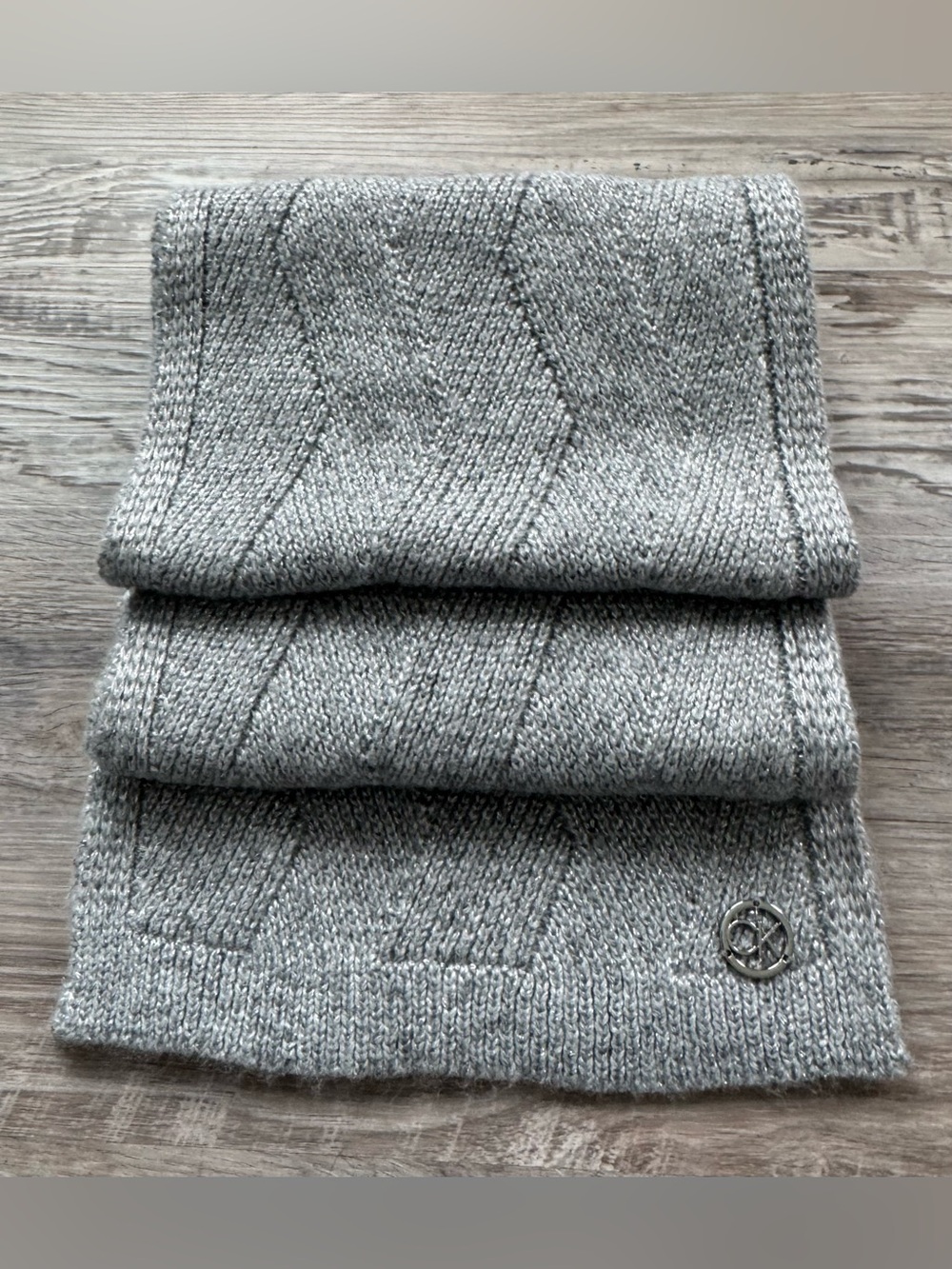 Calvin Klein. Women's grey Calvin Klein scarf (knit, with Lurex) featuring a sma